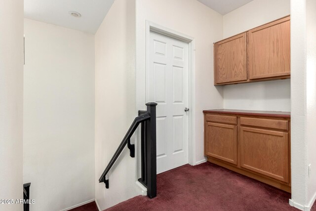 6505 S 15th Dr, Phoenix, AZ 85041 - corridor with an upstairs landing and dark carpet