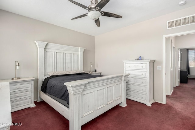 6505 S 15th Dr, Phoenix, AZ 85041 - bedroom featuring dark colored carpet, ceiling fan, and baseboards