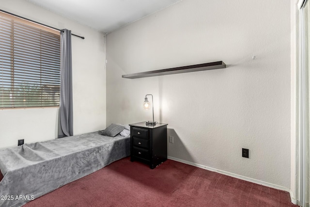 6505 S 15th Dr, Phoenix, AZ 85041 - bedroom featuring dark carpet and baseboards