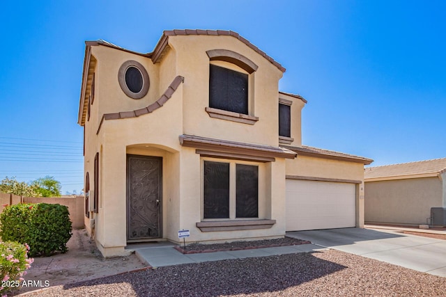 6505 S 15th Dr, Phoenix, AZ 85041 - mediterranean / spanish home with driveway, stucco siding, fence, and a tile roof