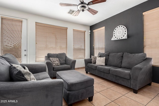 6505 S 15th Dr, Phoenix, AZ 85041 - living room with ceiling fan and light tile patterned floors