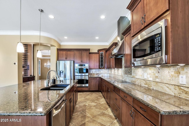 kitchen featuring stainless steel appliances, a sink, backsplash, wall chimney exhaust hood, and crown molding