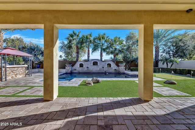 view of patio featuring a fenced backyard and a fenced in pool