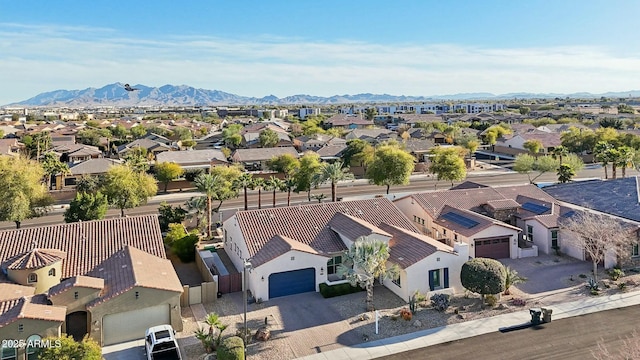 bird's eye view with a residential view and a mountain view