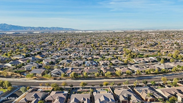 bird's eye view with a residential view and a mountain view