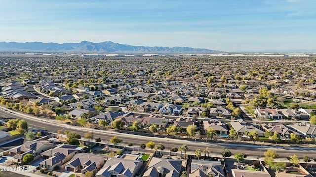 drone / aerial view featuring a residential view and a mountain view