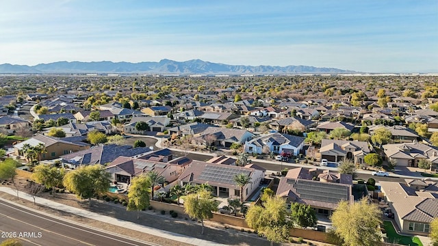 drone / aerial view with a mountain view and a residential view