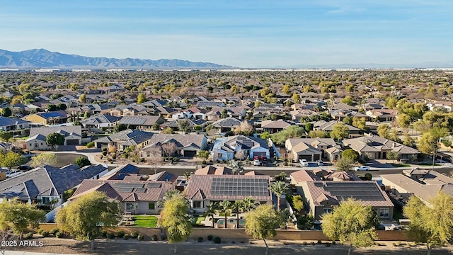 birds eye view of property with a residential view and a mountain view