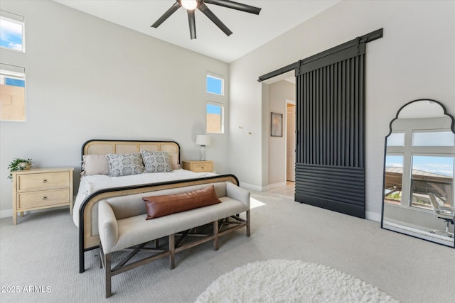 21391 W Mariposa St, Buckeye, AZ 85396 - bedroom featuring carpet floors, a barn door, and multiple windows