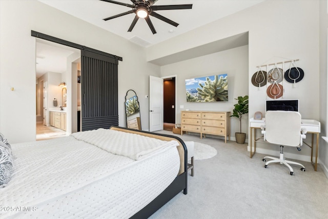 21391 W Mariposa St, Buckeye, AZ 85396 - bedroom with carpet flooring, a barn door, ensuite bathroom, and a ceiling fan