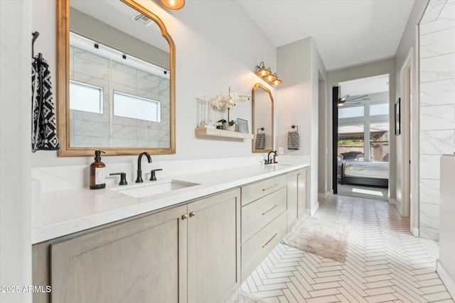 21391 W Mariposa St, Buckeye, AZ 85396 - ensuite bathroom featuring a ceiling fan and double vanity