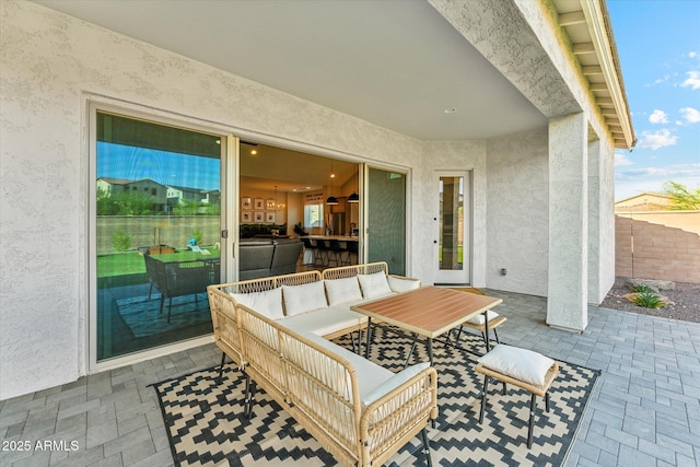 21391 W Mariposa St, Buckeye, AZ 85396 - view of patio / terrace with an outdoor living space and fence