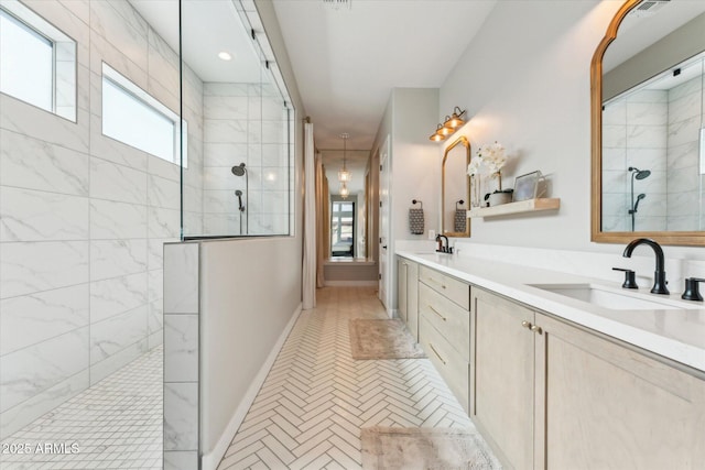 21391 W Mariposa St, Buckeye, AZ 85396 - bathroom with a walk in shower and double vanity