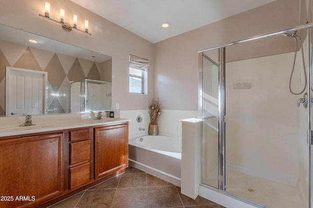 bathroom with independent shower and bath, vanity, and tile patterned floors