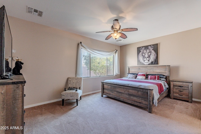 bedroom featuring light carpet and ceiling fan