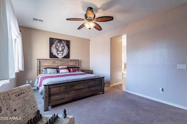 bedroom featuring ceiling fan and carpet