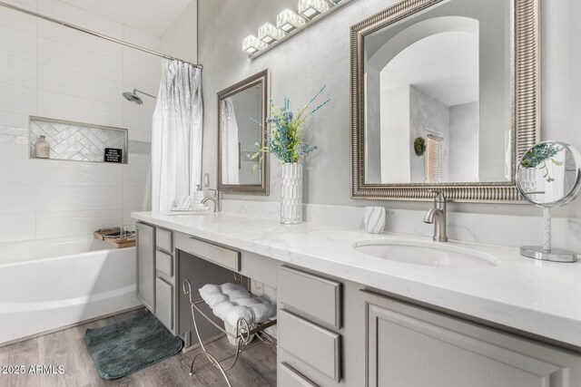 5015 E Cheyenne Dr Unit 31, Phoenix, AZ 85044 - bathroom featuring double vanity, a sink, wood finished floors, and shower / bath combo