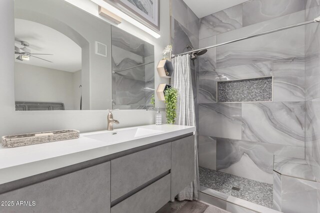 5015 E Cheyenne Dr Unit 31, Phoenix, AZ 85044 - bathroom with vanity, a ceiling fan, a shower with shower curtain, and visible vents