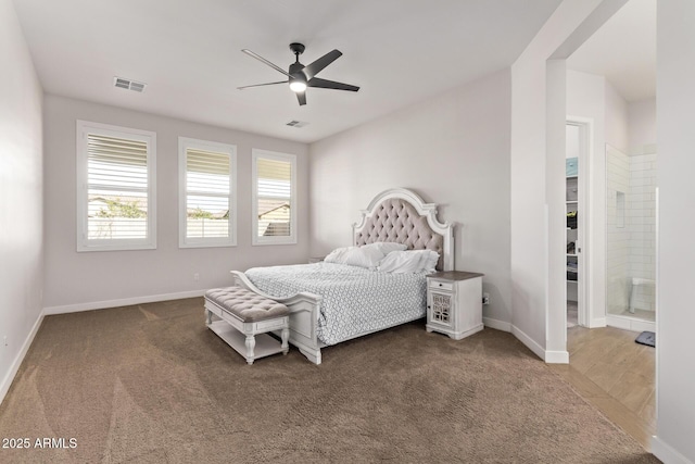 bedroom with carpet, visible vents, and baseboards