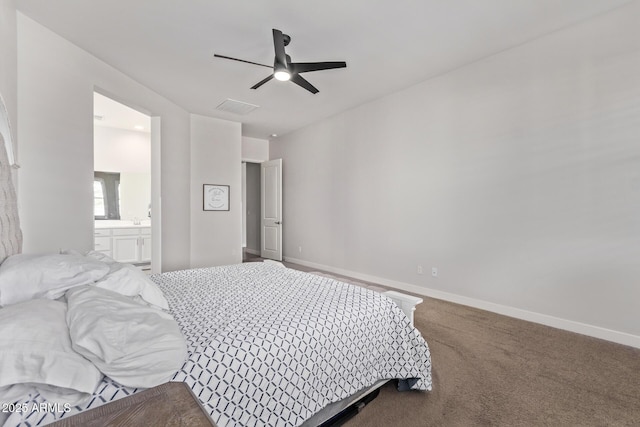 carpeted bedroom with ceiling fan, connected bathroom, and baseboards