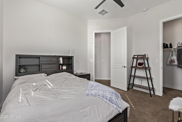 carpeted bedroom featuring visible vents, ceiling fan, and baseboards