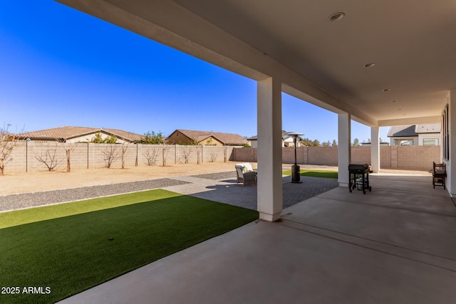 view of patio with a fenced backyard