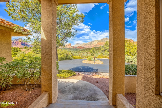 view of yard with a mountain view and a patio area