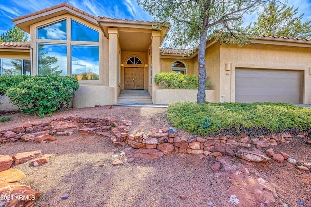 view of front of house with a garage