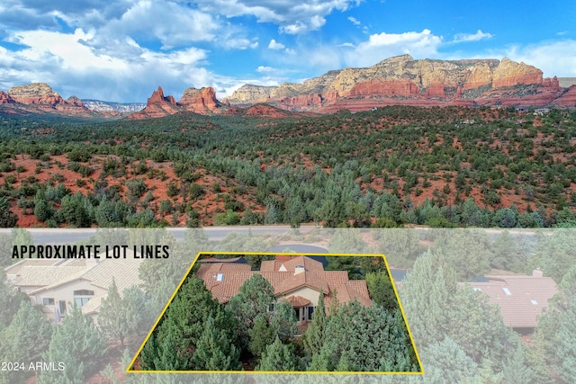 bird's eye view with a mountain view