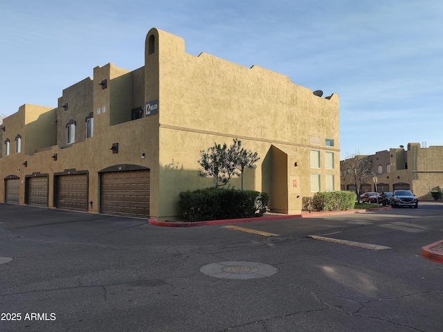 view of building exterior with a garage