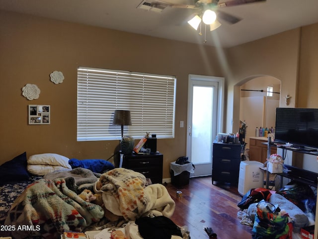 bedroom featuring ceiling fan and dark hardwood / wood-style flooring