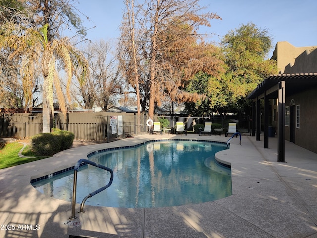 view of pool with a pergola and a patio area