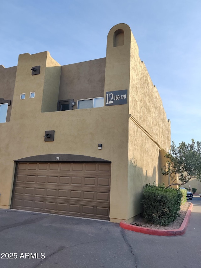 view of building exterior with a garage