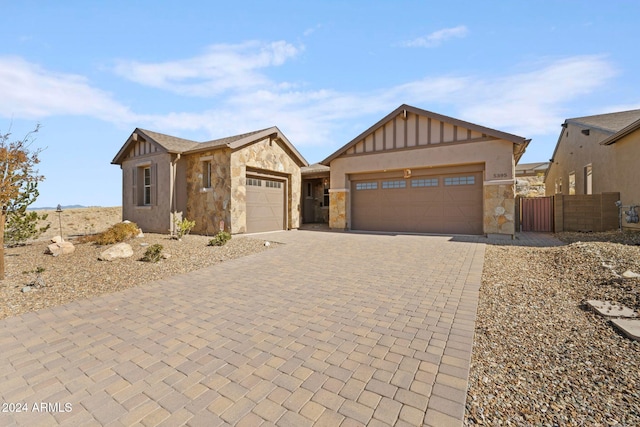 view of front of property featuring an outbuilding and a garage