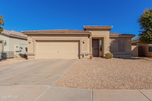 view of front of property featuring a garage