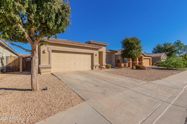 single story home with a garage