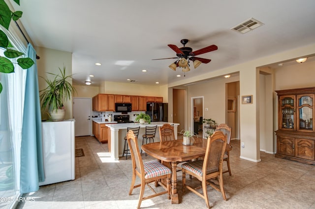 dining space with recessed lighting, visible vents, ceiling fan, and light tile patterned floors