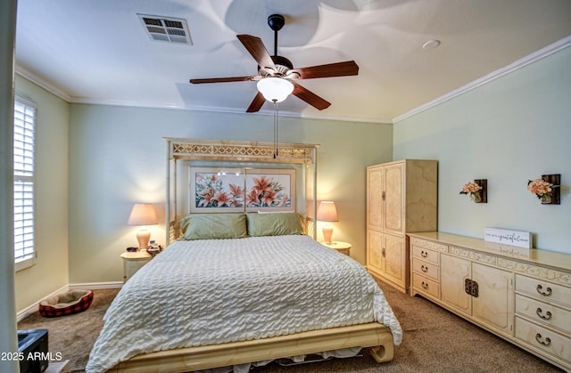 bedroom with a ceiling fan, visible vents, crown molding, and carpet flooring