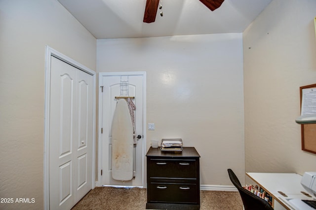 office space featuring carpet floors and a ceiling fan