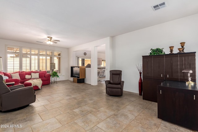 living room with ceiling fan