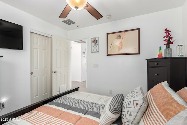 bedroom with visible vents and ceiling fan