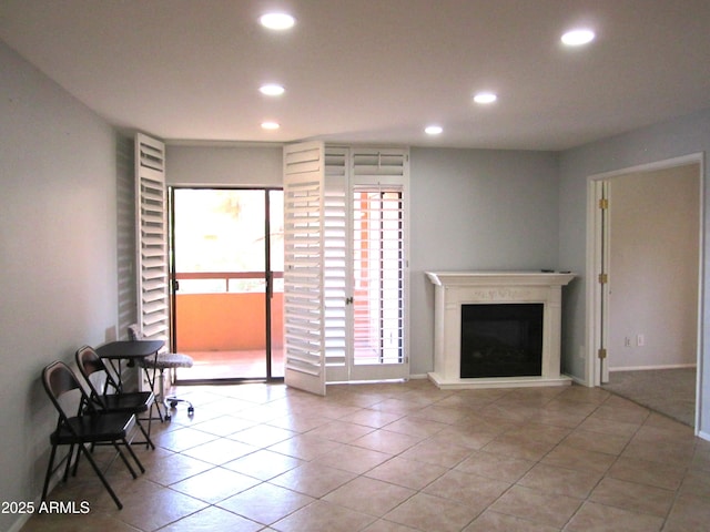 living room with light tile patterned flooring