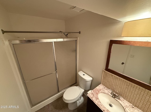 4849 W Northern Ave, Glendale, AZ 85301 - full bath with vanity, a stall shower, decorative backsplash, and tile patterned flooring
