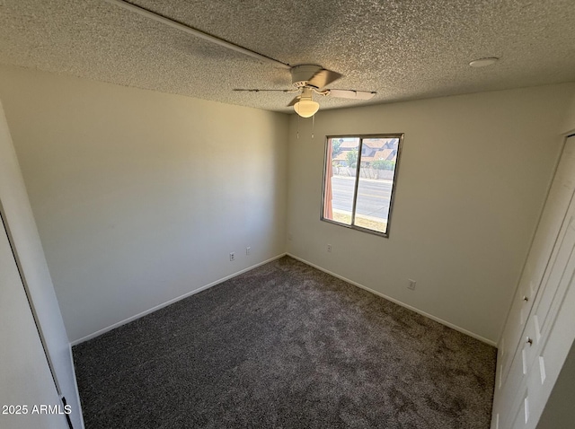 4849 W Northern Ave, Glendale, AZ 85301 - empty room with dark colored carpet, ceiling fan, and a textured ceiling