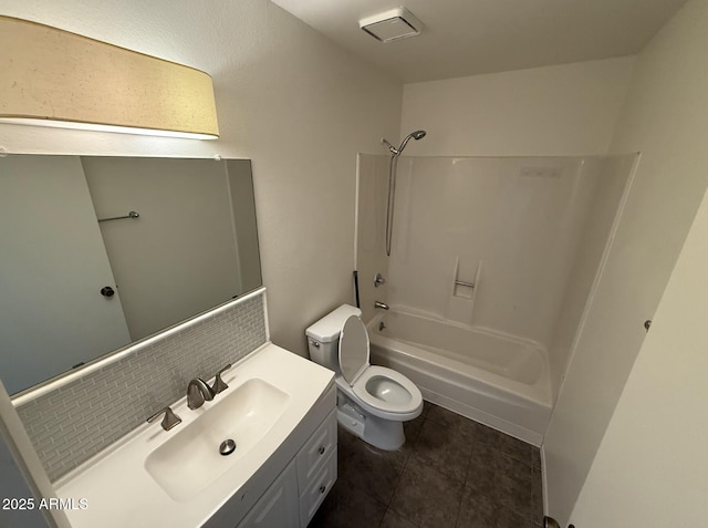4849 W Northern Ave, Glendale, AZ 85301 - full bathroom featuring vanity, shower / washtub combination, tile patterned flooring, and decorative backsplash