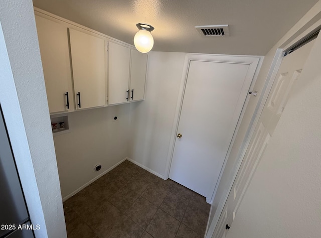 4849 W Northern Ave, Glendale, AZ 85301 - washroom with hookup for an electric dryer, cabinet space, washer hookup, a textured ceiling, and dark tile patterned flooring