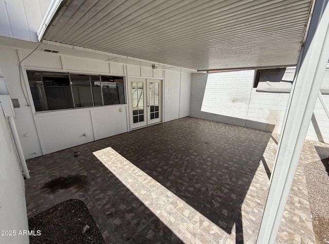 4849 W Northern Ave, Glendale, AZ 85301 - unfurnished sunroom featuring french doors