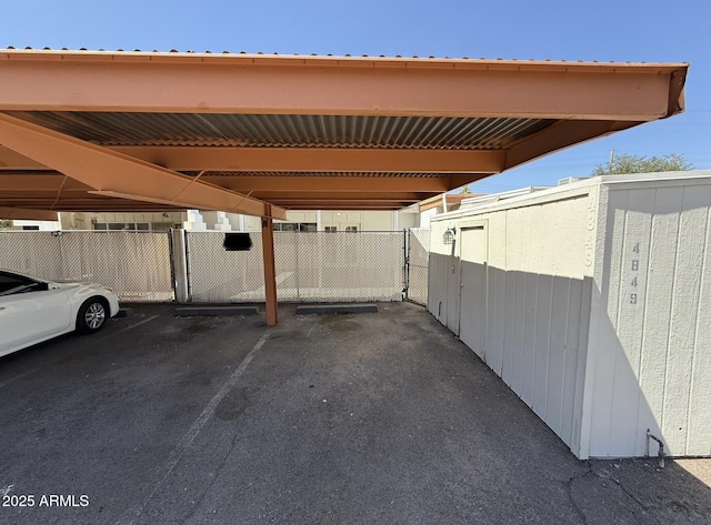 4849 W Northern Ave, Glendale, AZ 85301 - covered parking lot featuring a storage unit