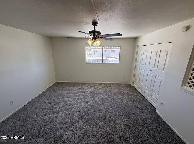 4849 W Northern Ave, Glendale, AZ 85301 - unfurnished bedroom with carpet, a textured ceiling, and a ceiling fan