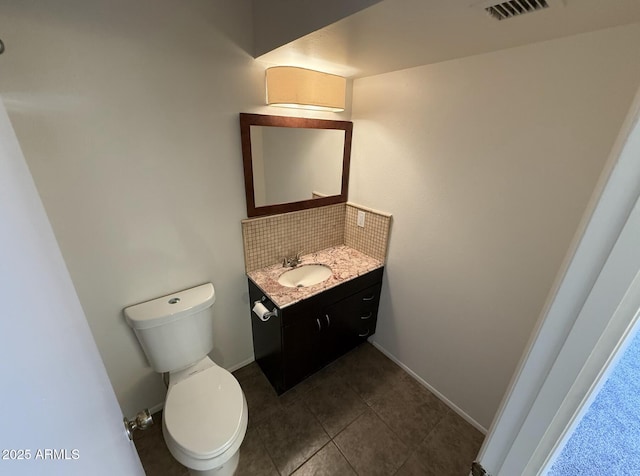 4849 W Northern Ave, Glendale, AZ 85301 - half bath with vanity, decorative backsplash, and tile patterned flooring